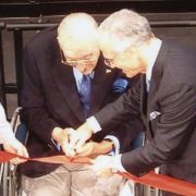 Max Fisher cutting the ribbon for the opening of the Max M. Fisher Music Center in 2003.