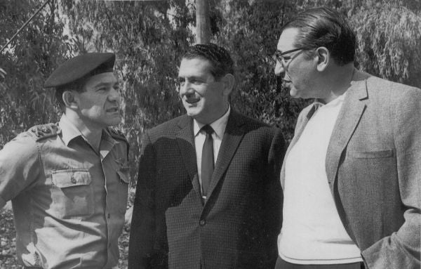 Max Fisher with a military official in Israel.
