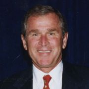 A signed photo to Max M. Fisher from President George W. Bush.