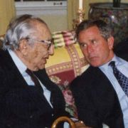 Max M. Fisher and President George W. Bush discussing matters in the White House.