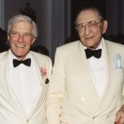 Max M. Fisher and Robert Mosbacher, Secretary of Commerce under President George H.W. Bush, sport white tuxedos at an event in Washington.