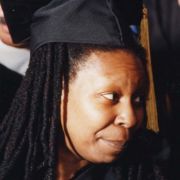 Max Fisher with Whoopi Goldberg at Brandeis University Commencement, May 1997.