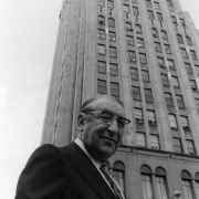 Max Fisher in front of the iconic Fisher Building in Detroit, and in his office on the 22nd floor.
