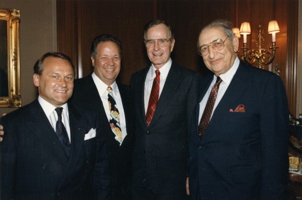 Max M. Fisher with George H. W. Bush and others.