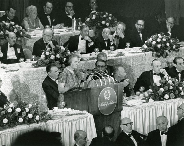 Golda Meir addresses a dinner crowd that includes Abe Feinberg, Max M. Fisher, Herbert Friedman, Yosef Tekoah, Dewey D. Stone and Jacob K. Javits.