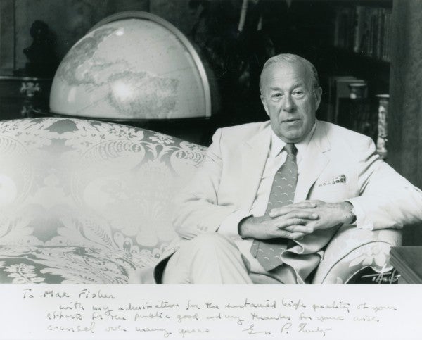 A portrait of Former Secretary of State George Shultz inscribed to Max FIsher.