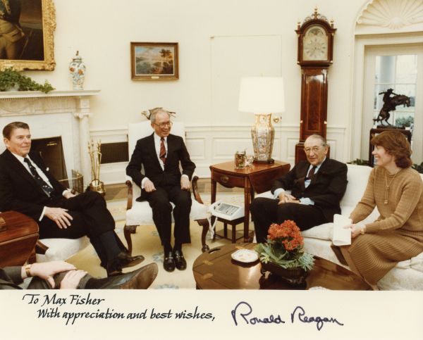 A signed photo from a meeting with President Reagan.