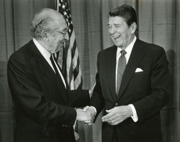 President Reagan shaking hands with Max Fisher while awarding him the Presidential Citizen Medal at the White House in 1989.