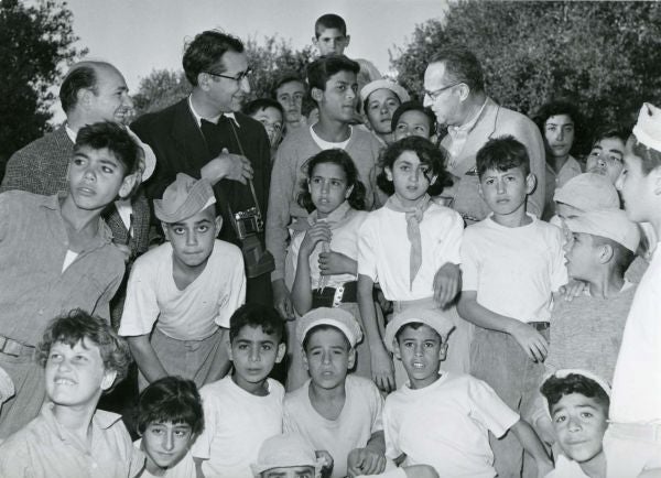 Members of the United Jewish Appeal Study Mission with Israeli children.