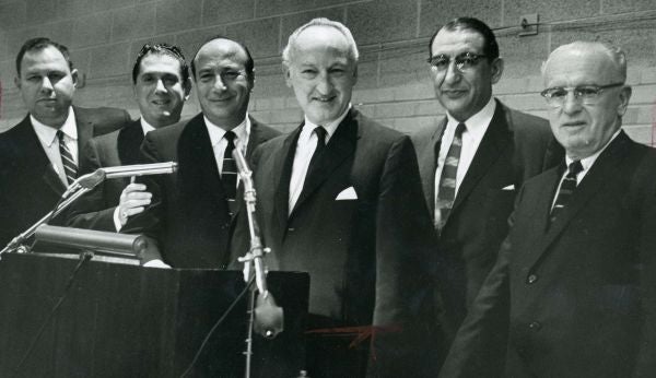 A. Alfred Taubman, Sol Enisenberg, Paul Zuckerman, an unidentified person, Max M. Fisher, and Charles Gershenson in 1961.