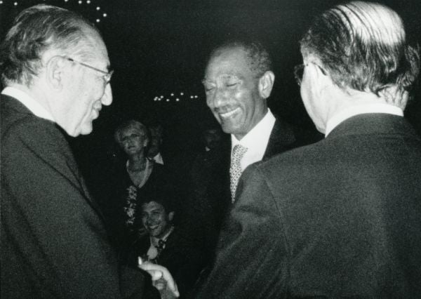 Max M. Fisher, Egyptian President Anwar el-Sadat, and Israeli Prime Minister Menachem Begin at the White House dinner celebrating the signing of the Camp David accords.
