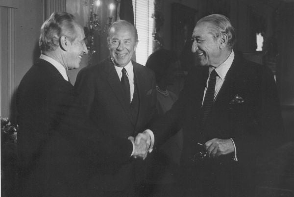 Max Fisher with Israeli President and former Prime Minister Shimon Peres and former Secretary of State George Shultz in 1986.