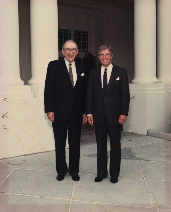 Max Fisher with Secretary of State Robert Mosbacher at the White House in 1989.