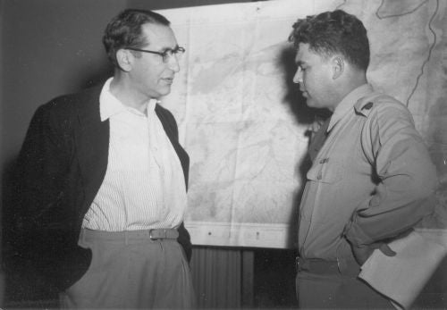 Max Fisher meets with a member of the Israeli Army in Jerusalem in 1954.