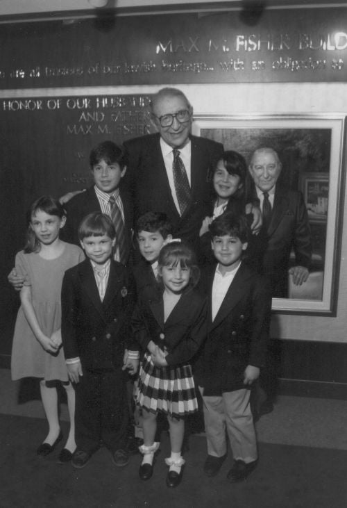 Max Fisher poses with his grandchildren at the dedication ceremony of the Max M. Fisher building, the new headquarters of the Jewish Federation of Metropolitan Detroit in 1992.